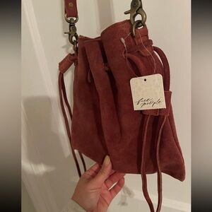 Brand new tags on never used Free People suede bag